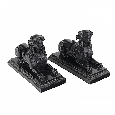 Pair of patinated resin sphinxes in black