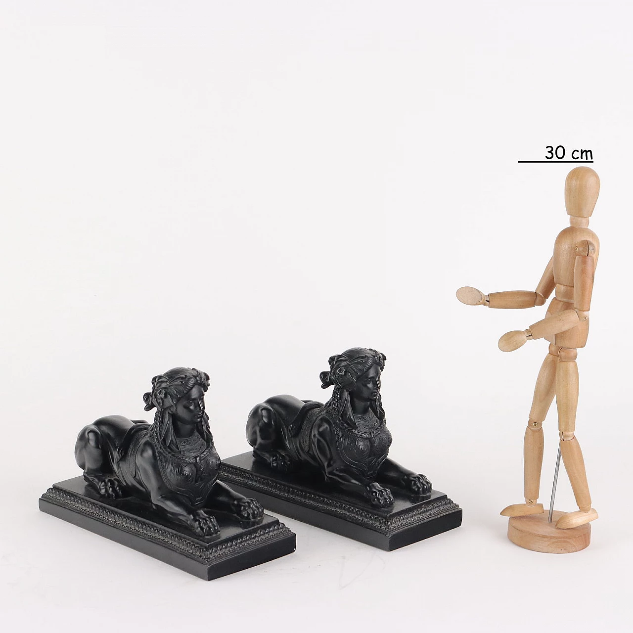 Pair of patinated resin sphinxes in black 2
