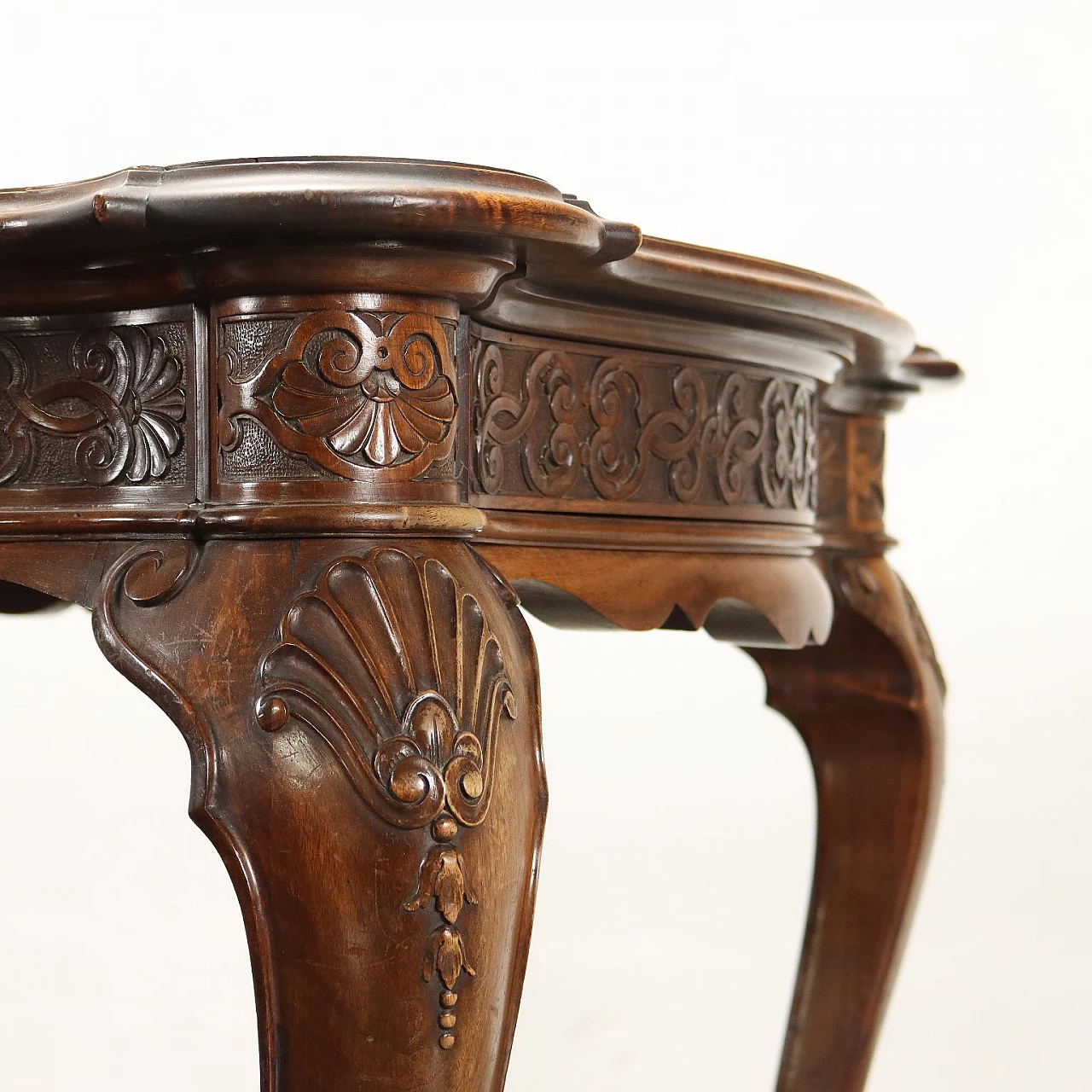 Walnut table with carvings 8