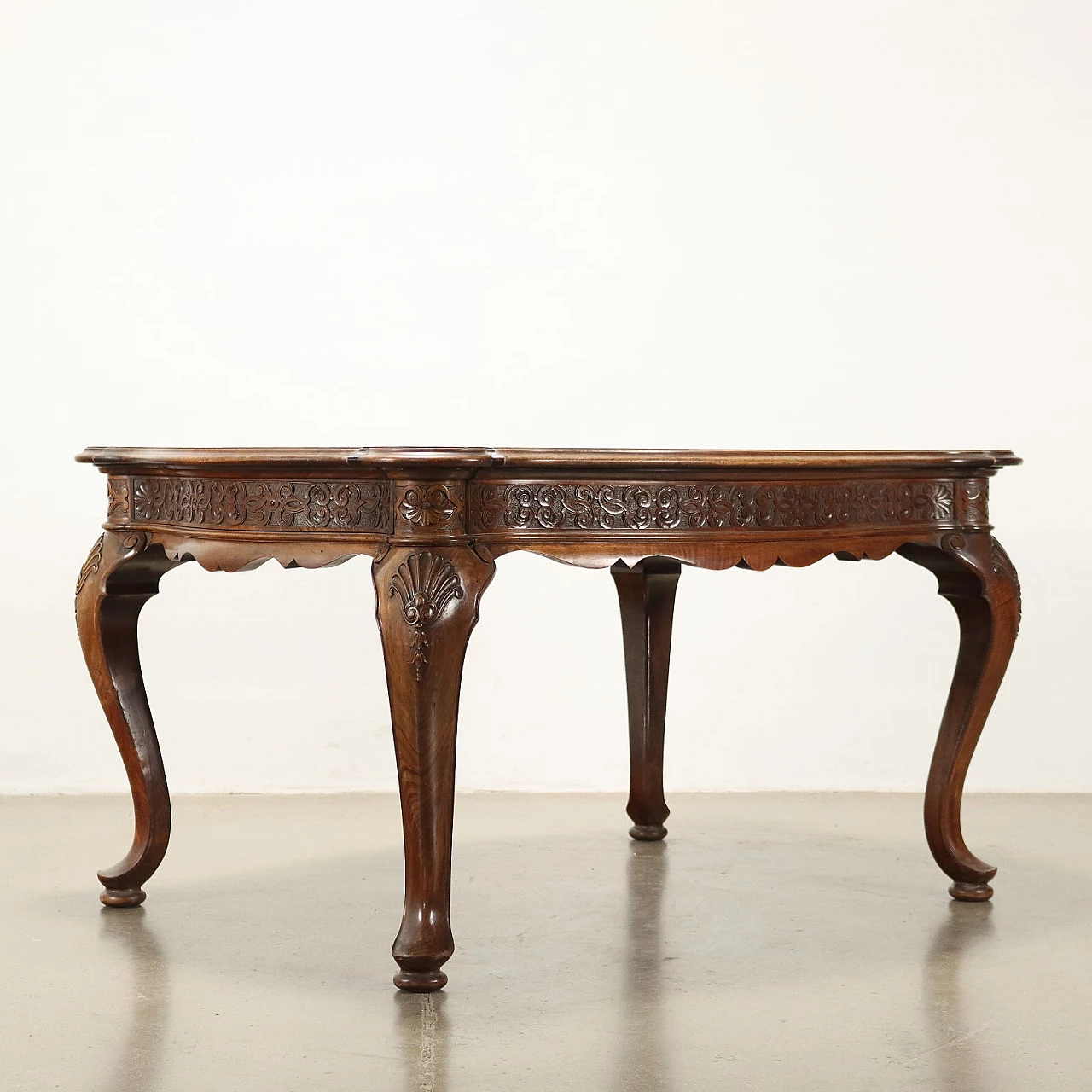 Walnut table with carvings 10