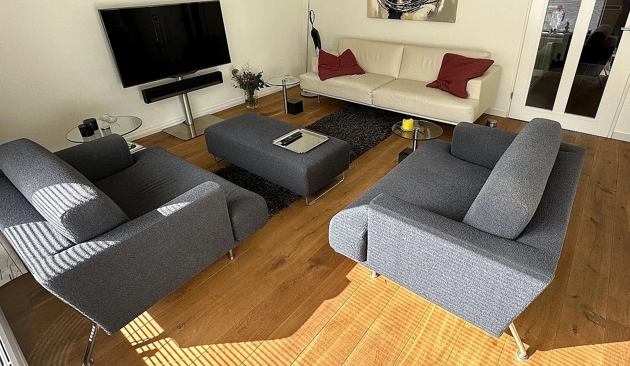 Nest 253 sofa, pair of armchairs and footstool by Cassina 2