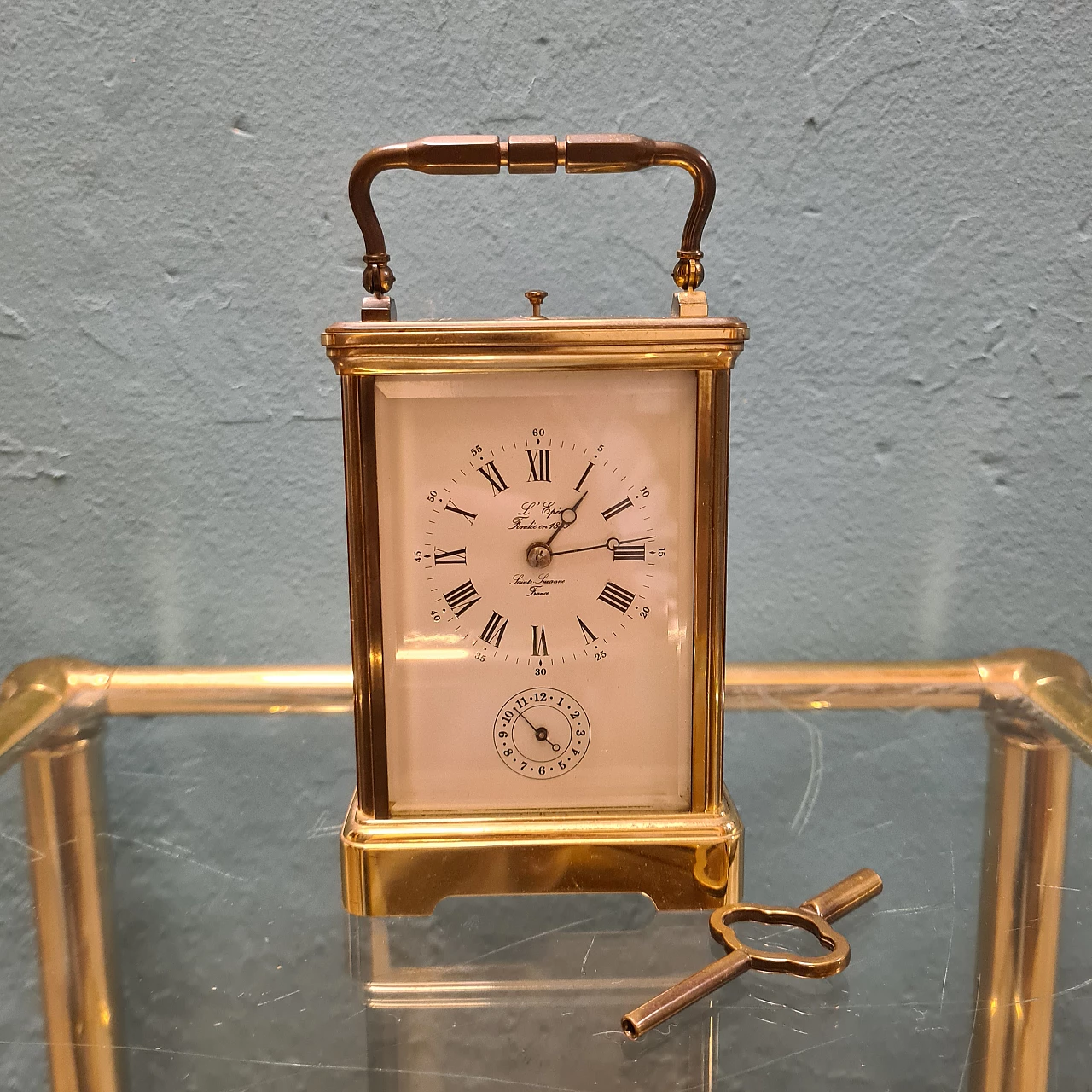 Brass and glass travel clock by L'Epée 1