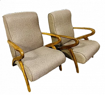 Pair of solid chestnut and fabric armchairs, 1960s