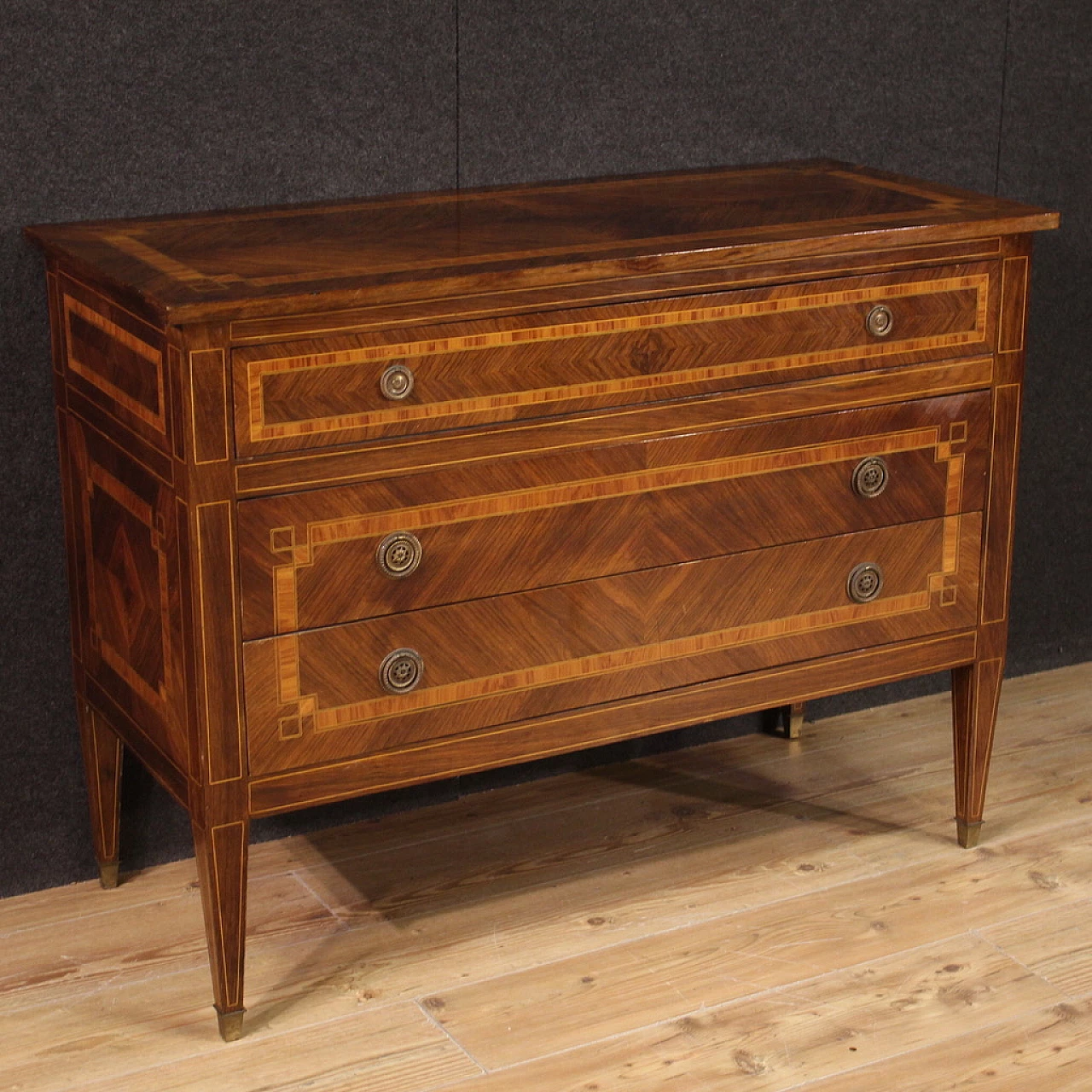 Walnut and maple chest of drawers with bronze feet 1