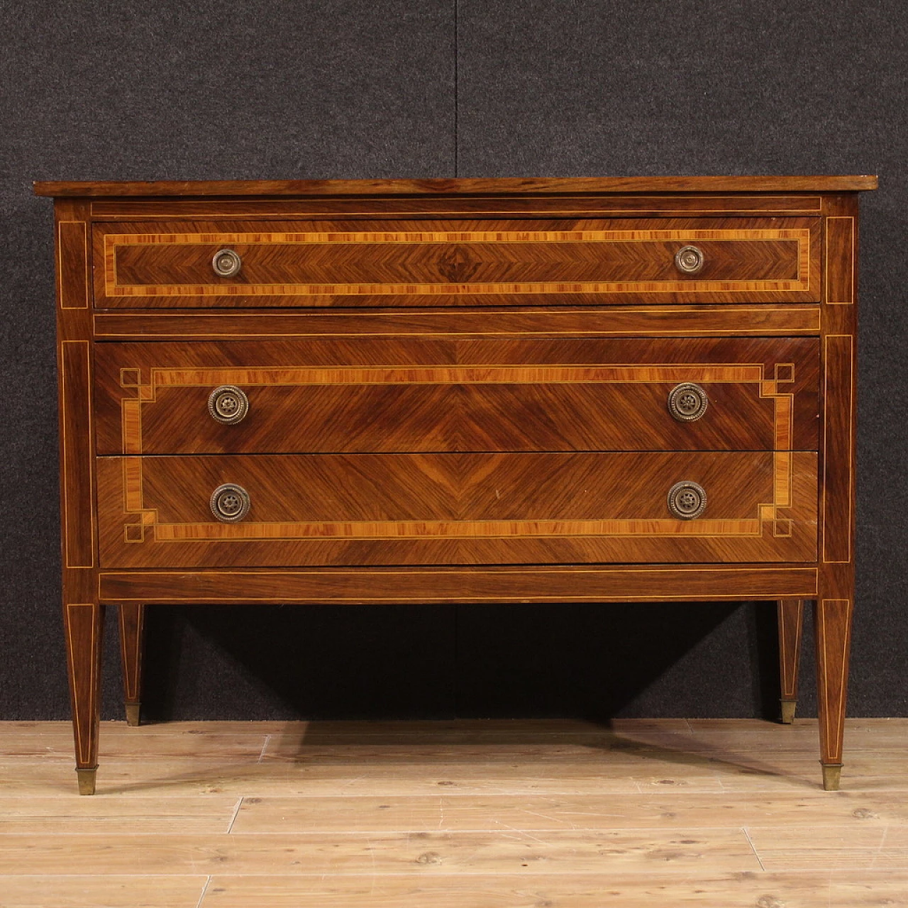 Walnut and maple chest of drawers with bronze feet 2