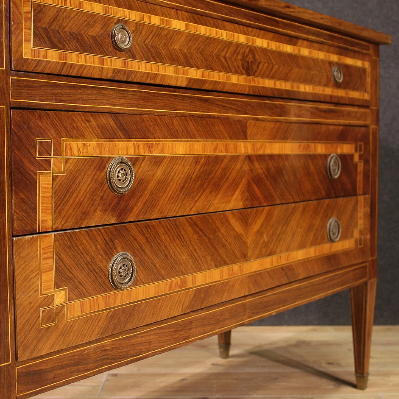 Walnut and maple chest of drawers with bronze feet 10