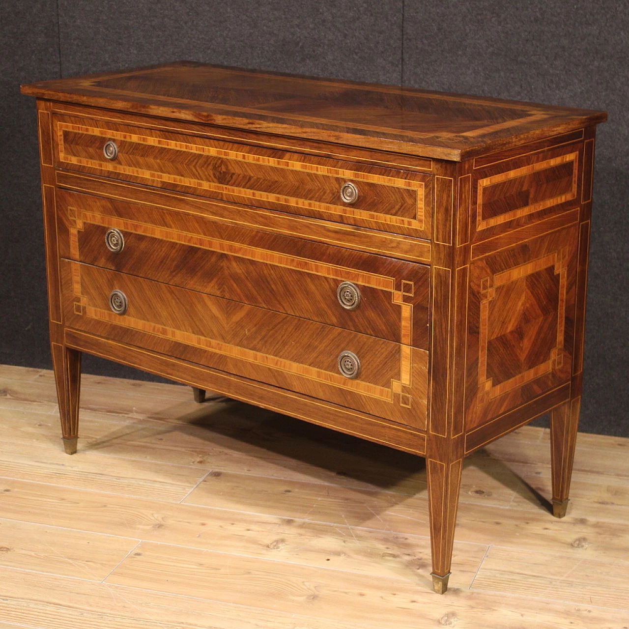 Walnut and maple chest of drawers with bronze feet 11