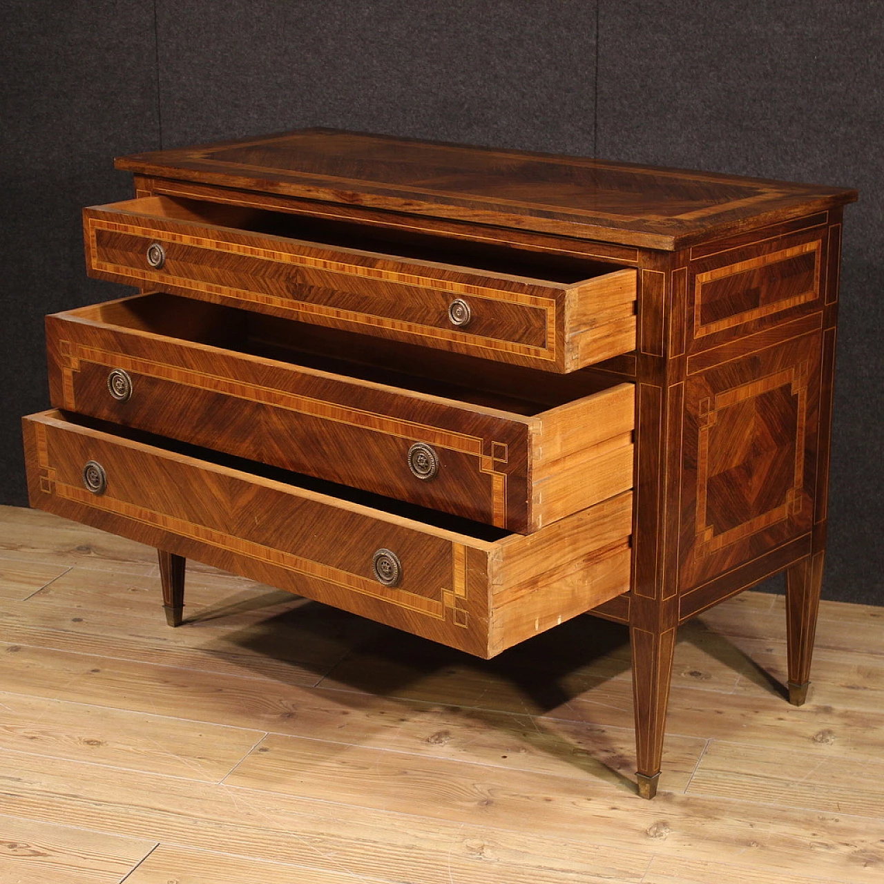 Walnut and maple chest of drawers with bronze feet 12