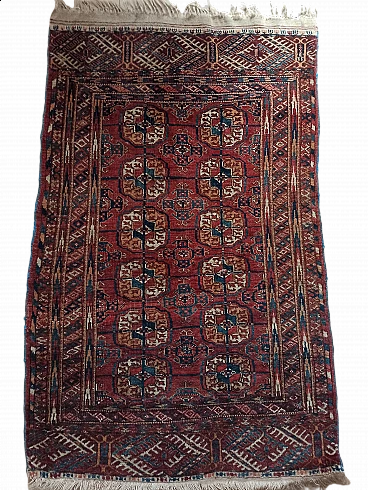 Red bukara rug in wool and cotton, late 19th century