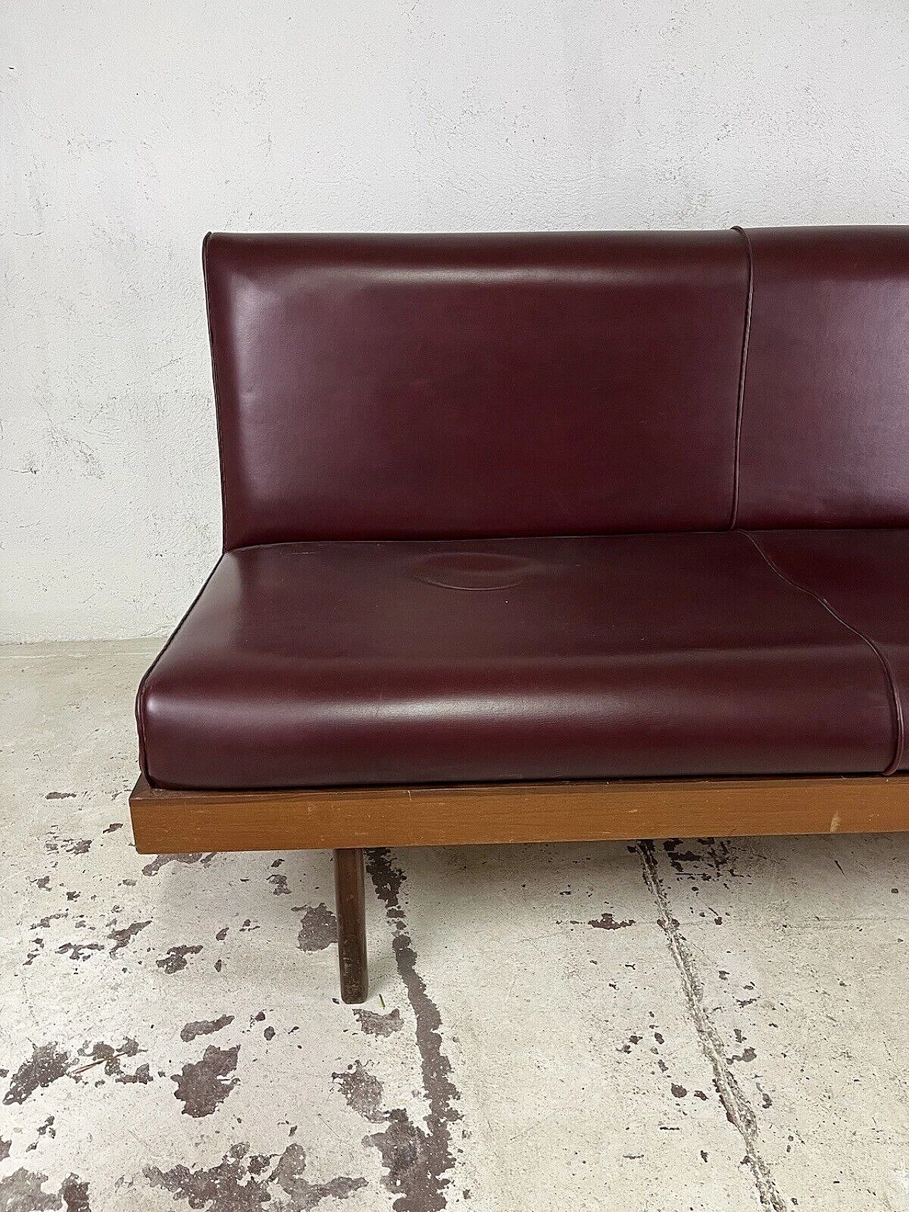 Wood and burgundy leatherette three-seater sofa, 1960s 2