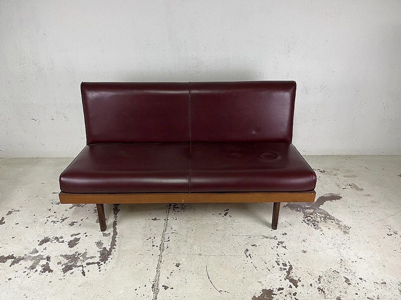 Wood and burgundy leatherette three-seater sofa, 1960s 11
