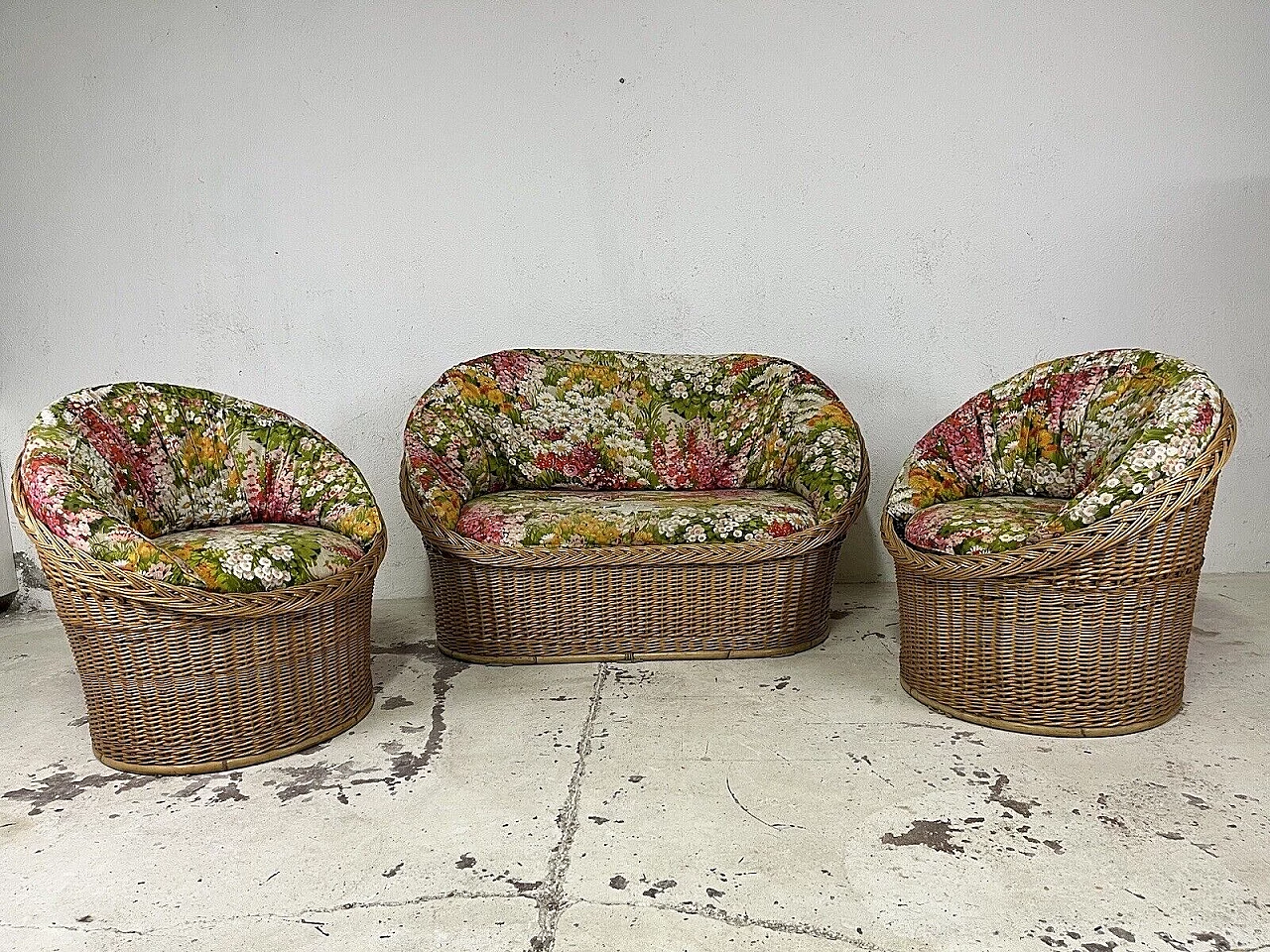 Sofa and pair of armchairs in wicker and floral fabric, 1980s 1