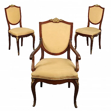 Pair of chairs and an armchair in mahogany with bronze details