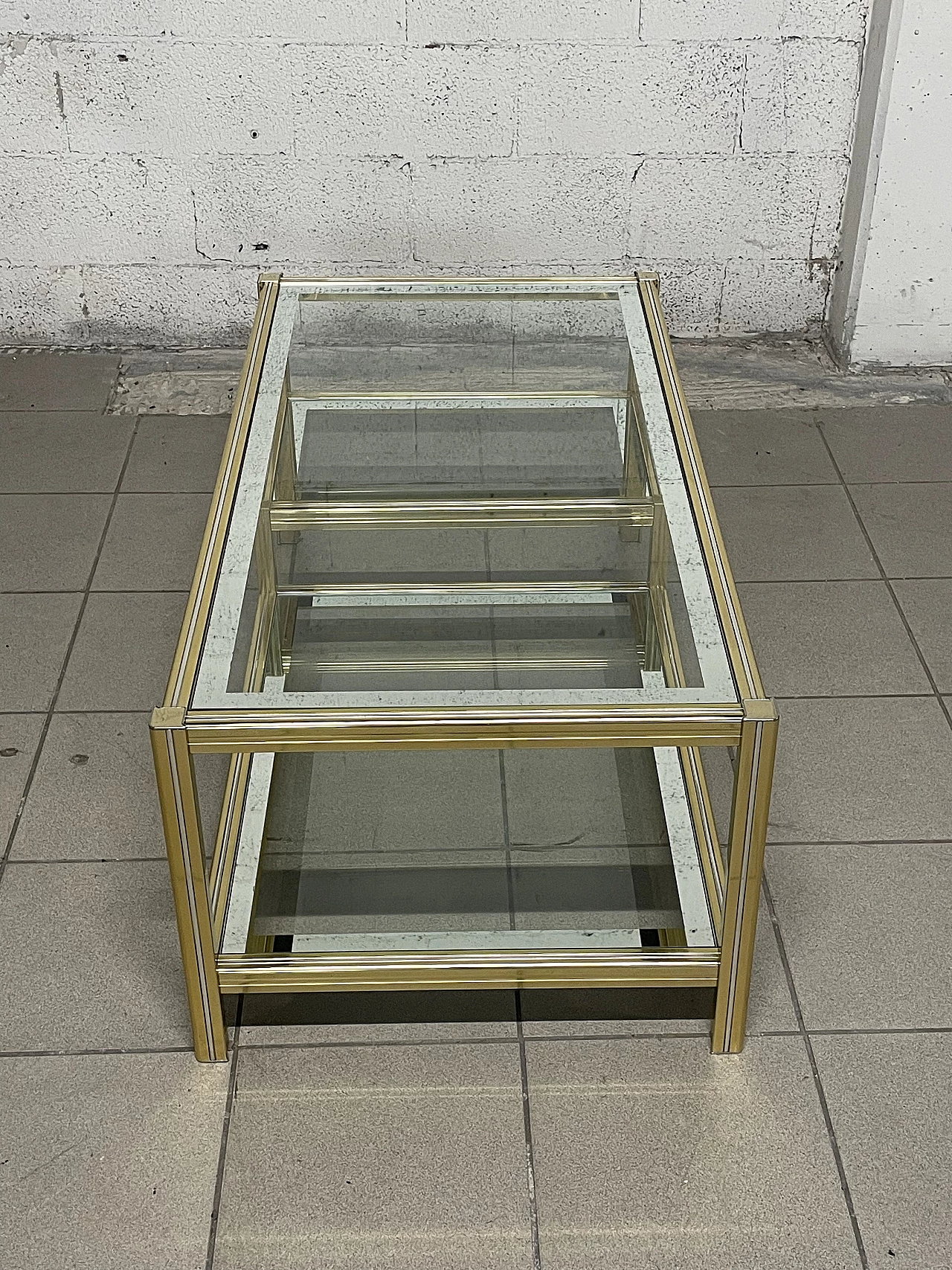 Glass and brass coffee table, 1970s 29