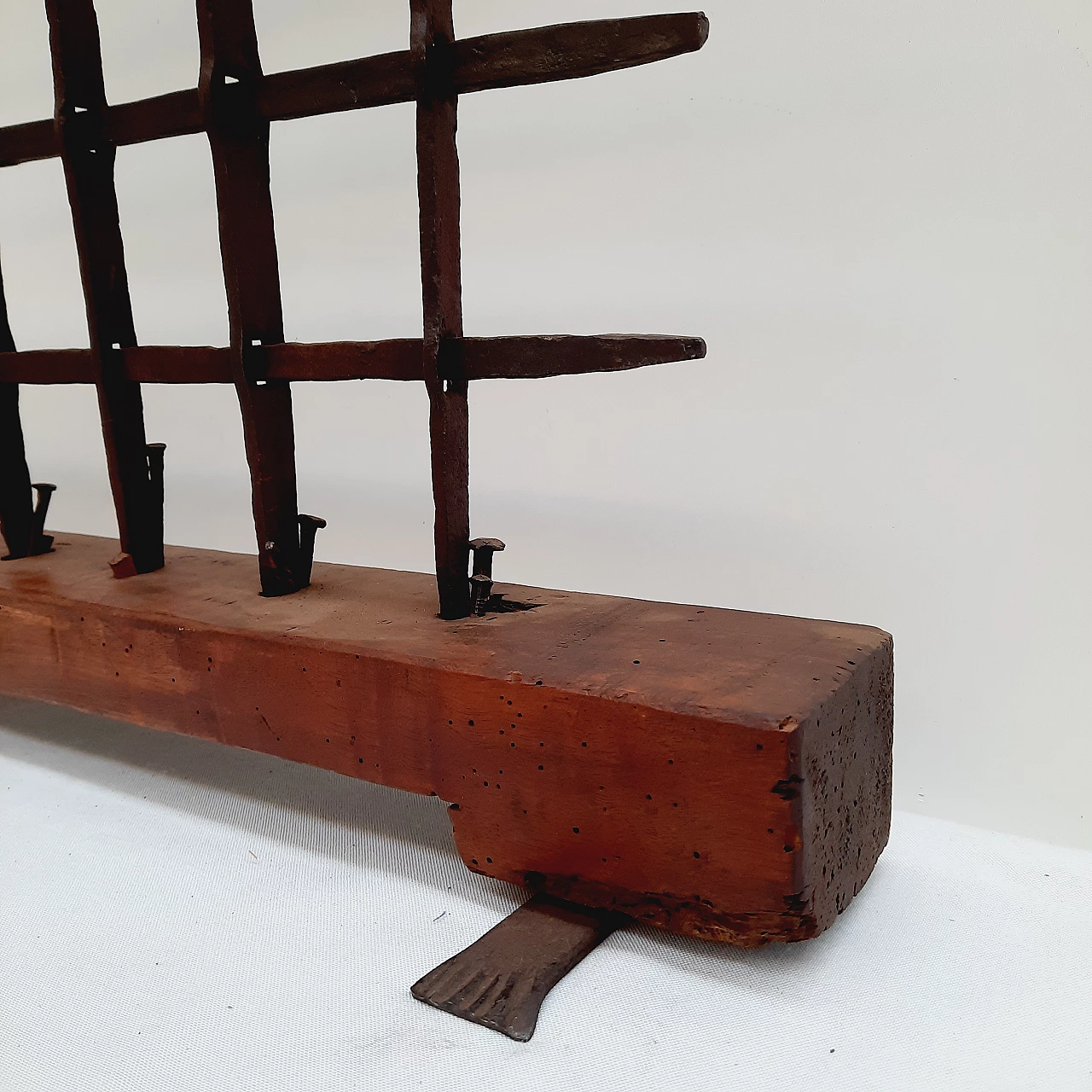 Black wrought iron grate with wooden base, 18th century 2