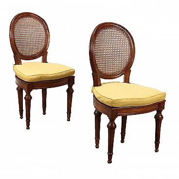 Pair of walnut and cane chairs with removable cushions, 18th century