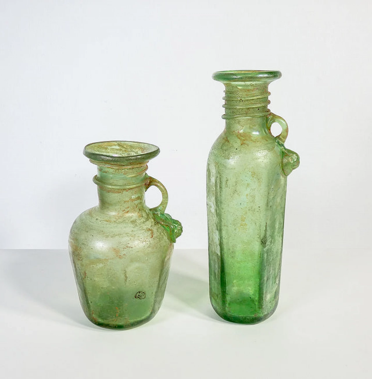 Pair of green scavo blown glass vases 1