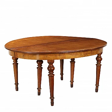 Round extendable walnut table, 19th century