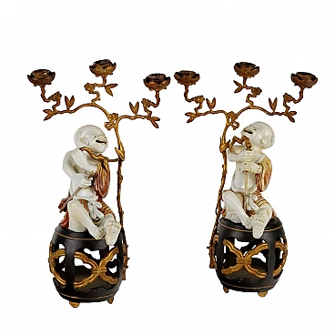 Pair of porcelain and gilded bronze candle holders, 19th century