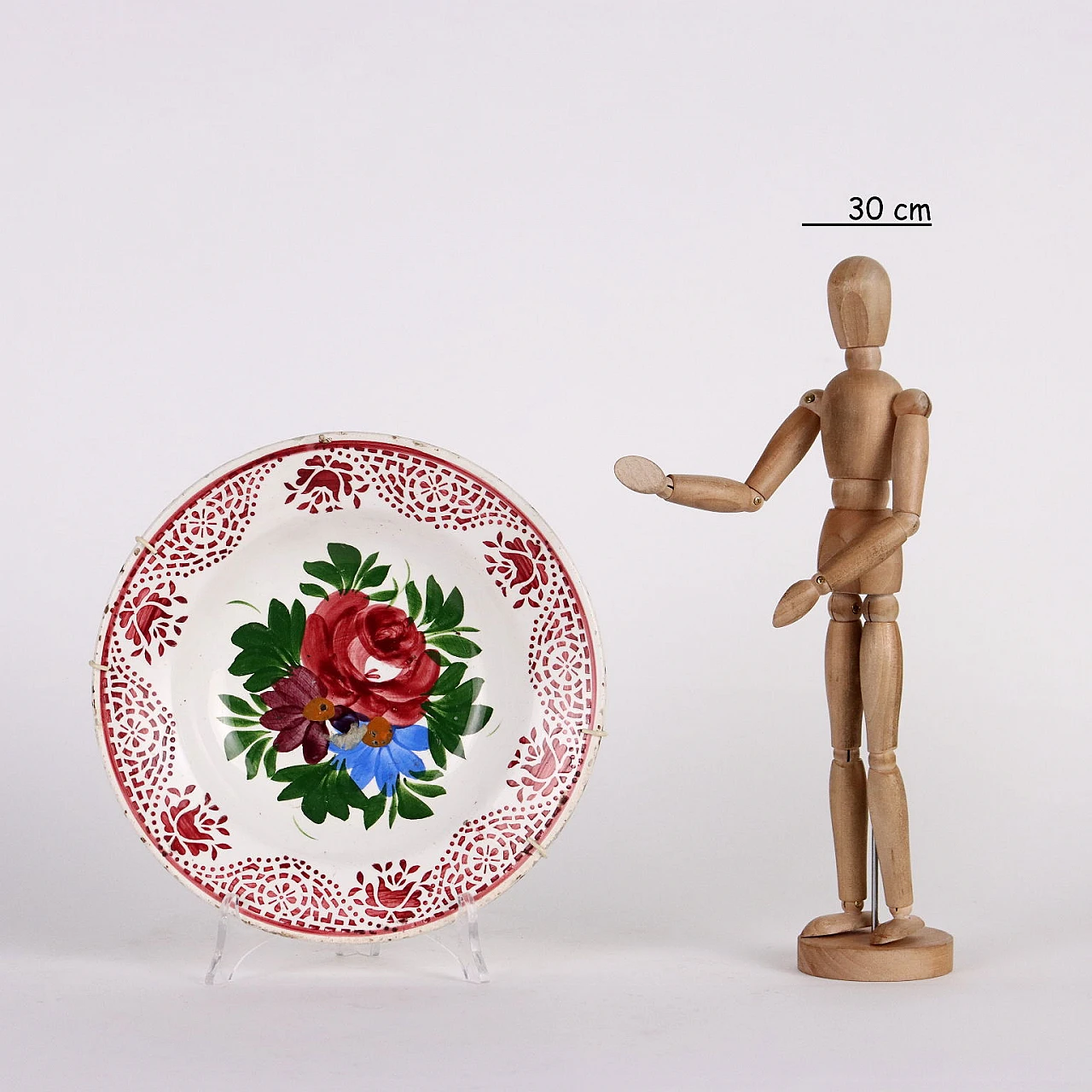 Piatto in ceramica maiolicata con decori floreali policromi 2