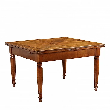 Extendable table in cherry and walnut with turned legs, 19th century