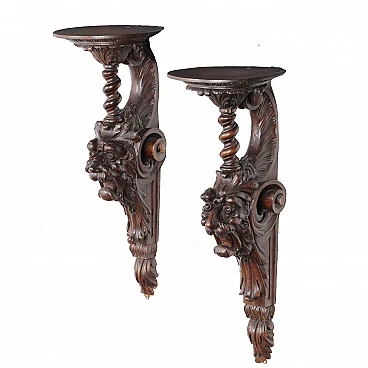 Pair of carved mahogany shelves, 19th century