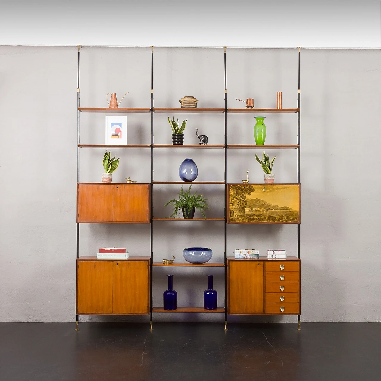 Floor-to-ceiling bookcase with decorated bar compartment, 1960s 1