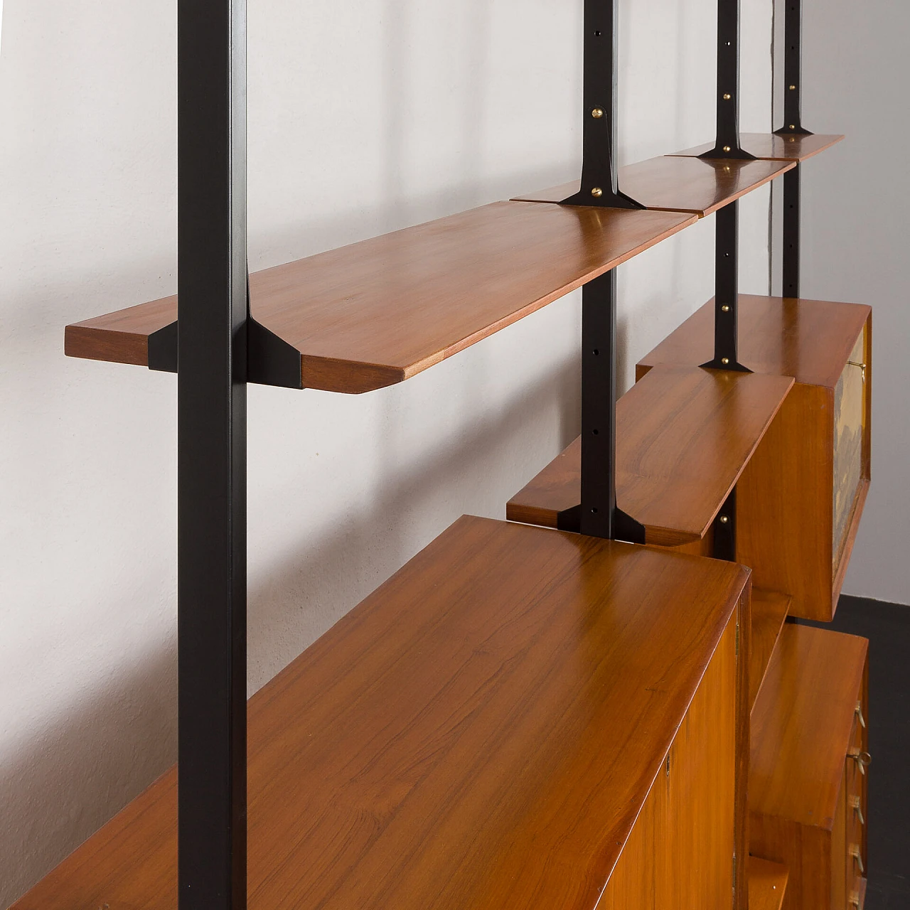 Floor-to-ceiling bookcase with decorated bar compartment, 1960s 18