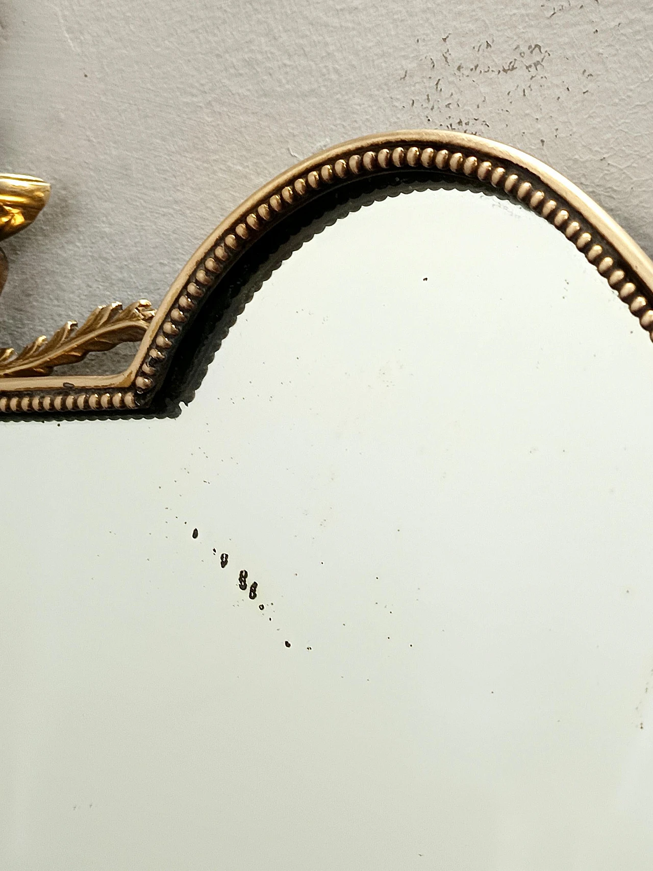 Brass shield-shaped wall mirror, 1950s 9