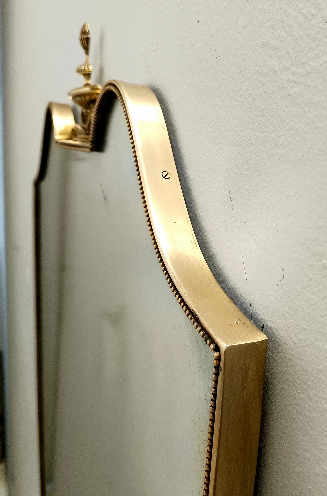 Brass shield-shaped wall mirror, 1950s 10