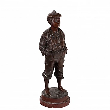 Whistling boy, bronze sculpture on marble base