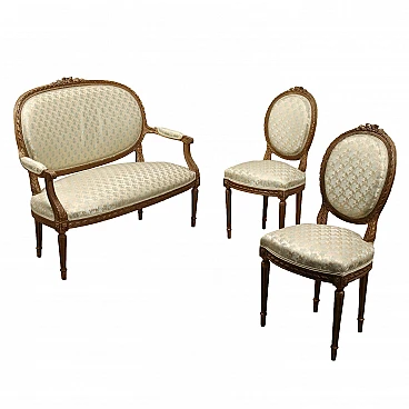 Pair of chairs and a sofa in carved & gilded wood, 19th century
