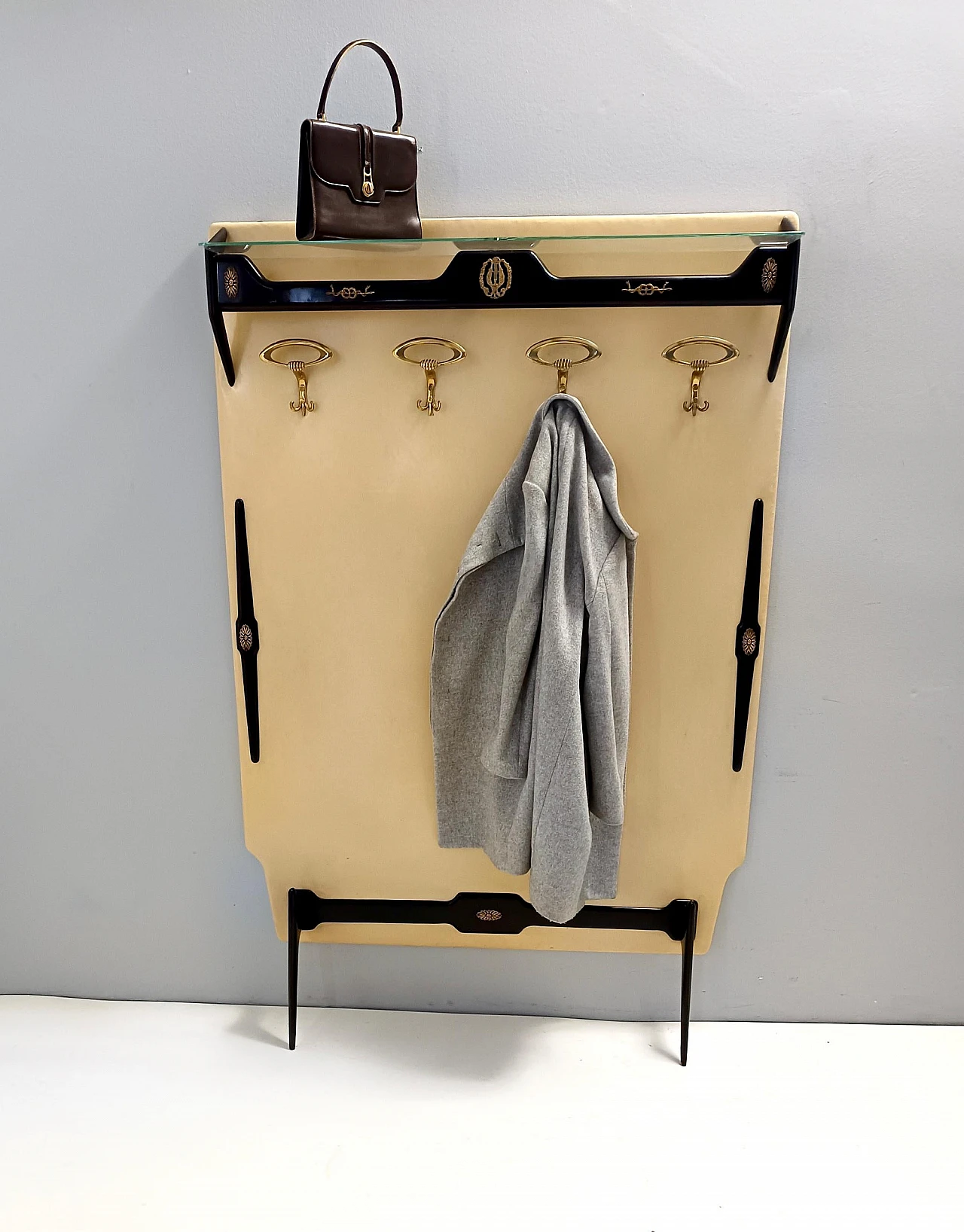 Coat stand in ebonised beech, brass, skai and glass, 1950s 2