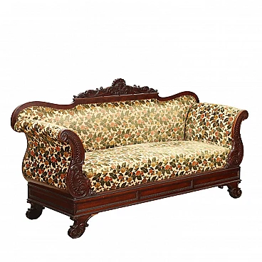 Mahogany sofa with carved leaf motifs and floral fabric, 19th century