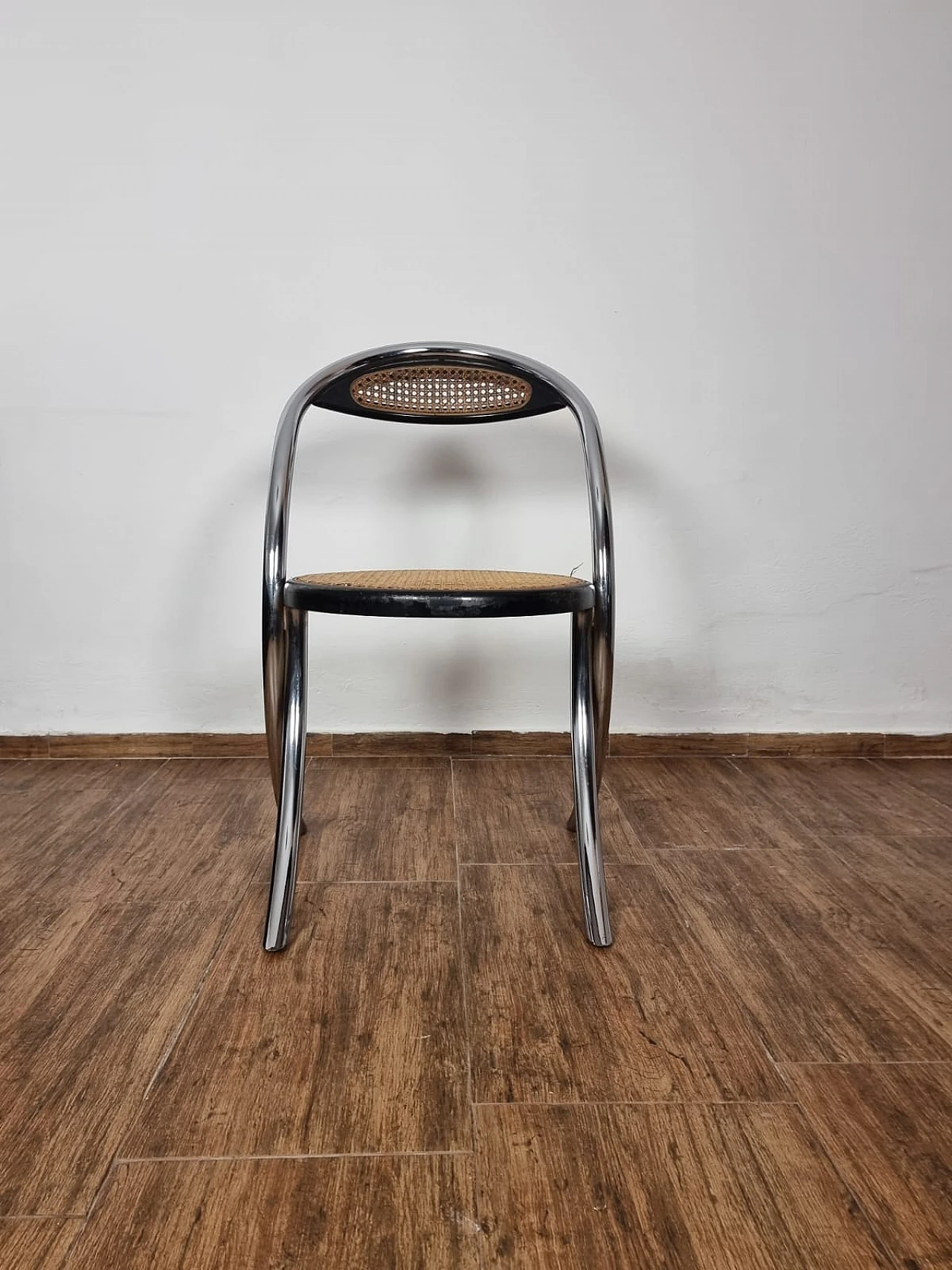 4 Chairs in chromed tubular metal with woven seats, 1980s 4