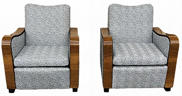 Pair of blond walnut armchairs with ebonized feet, 1940s