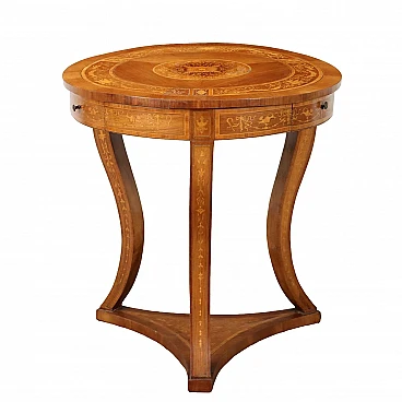 Round side table inlaid with phytomorphic motifs & wavy legs