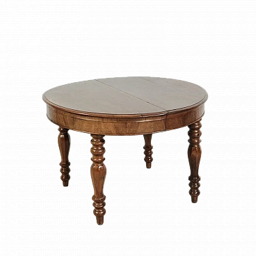 Round walnut extendable table, late 19th century