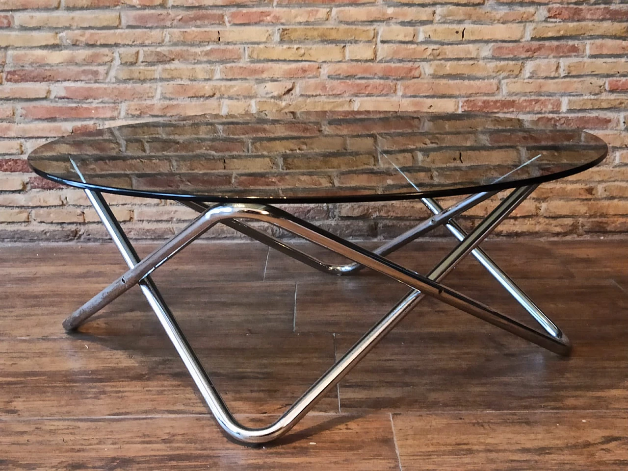Chromed steel coffee table with black glass top, 1970s 3