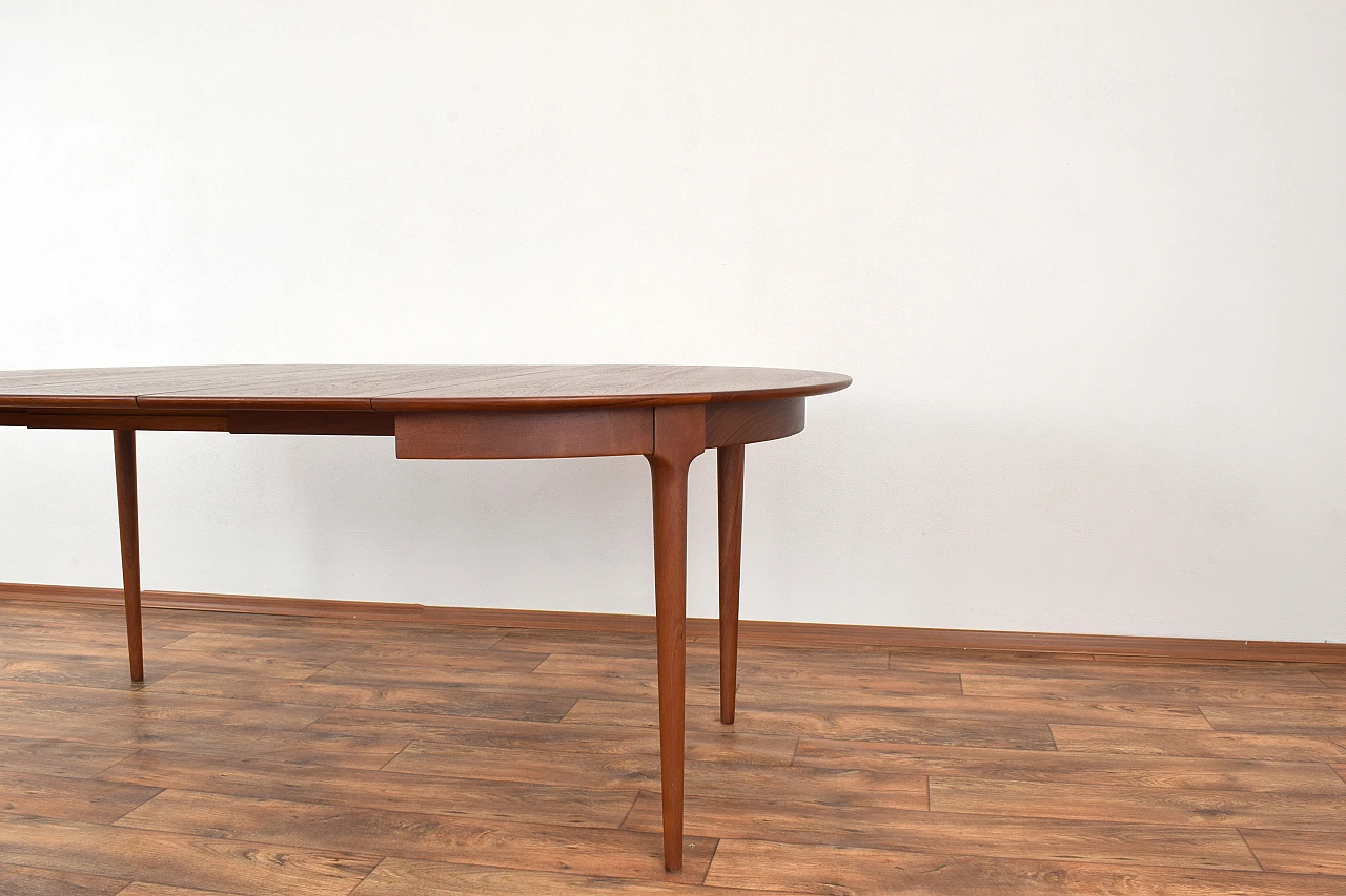 Danish round extendable teak table, 1960s 7