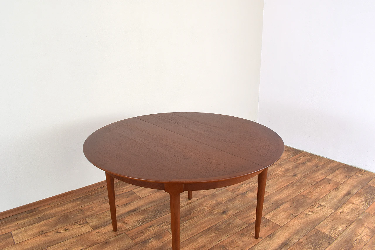 Danish round extendable teak table, 1960s 11