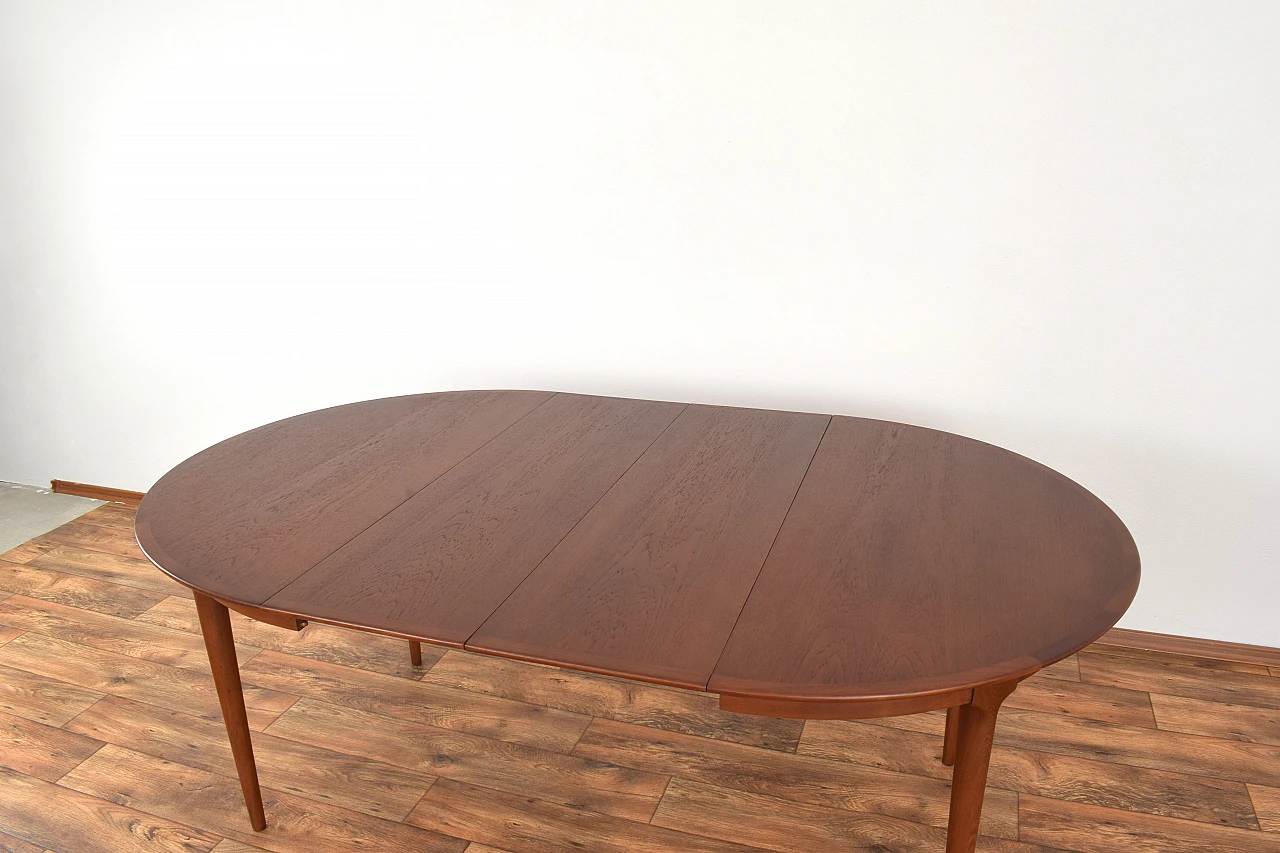 Danish round extendable teak table, 1960s 13