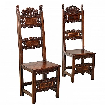 Pair of walnut carved folder chairs, 18th century