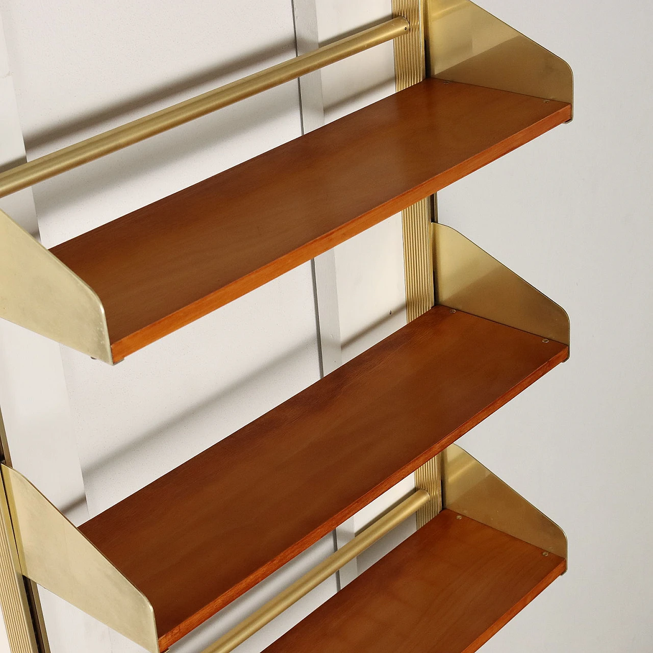 Mahogany veneered wood wall bookcase with brass-plated aluminium uprights by Feal, 1960s 3