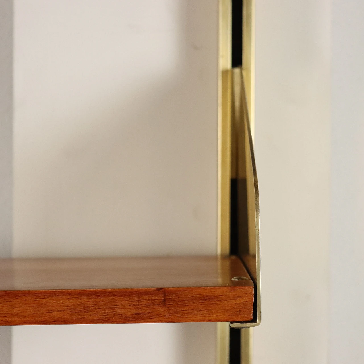 Mahogany veneered wood wall bookcase with brass-plated aluminium uprights by Feal, 1960s 6