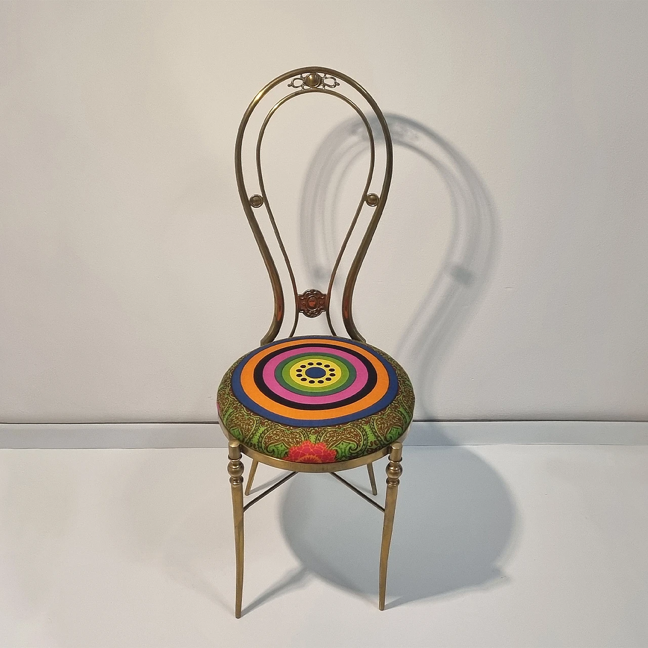 Brass chair with multicolored geometric and floral fabric, 1970s 1