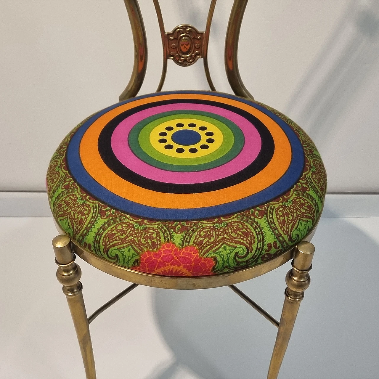 Brass chair with multicolored geometric and floral fabric, 1970s 2