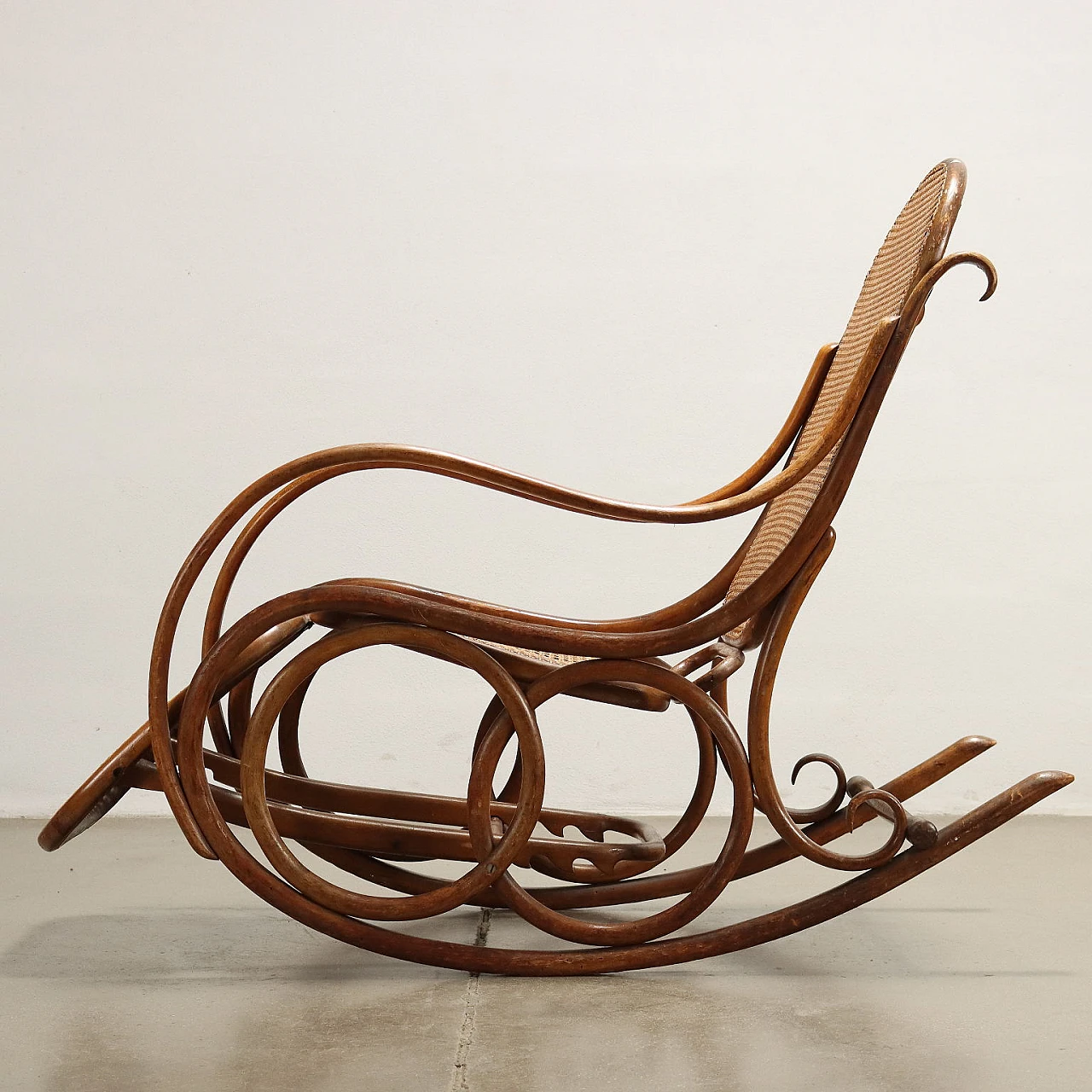 Bent beech and cane rocking chair by Thonet, late 19th century 4