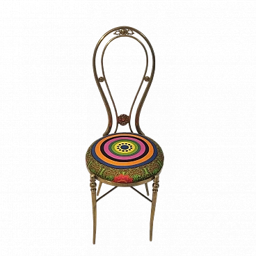 Brass chair with multicolored geometric and floral fabric, 1970s