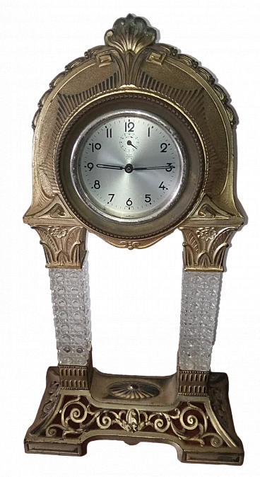 Bronze and crystal table clock with embossed decorations, 1940s